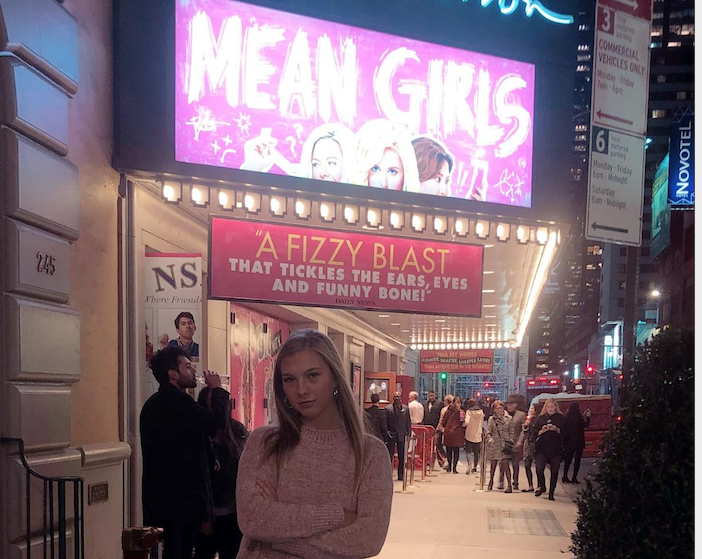 Hannah Taylor, 12, stands in front of the August Wilson Theater in New York City on October 19, 2018, right before the broadway performance of Mean Girls.
