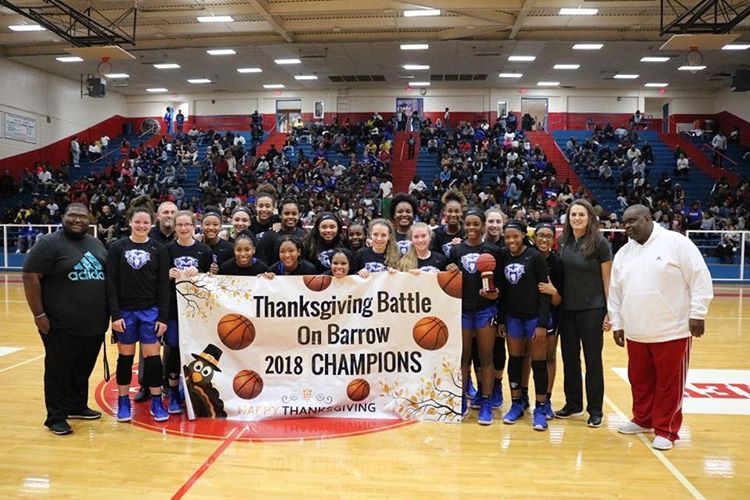 The Lady Cats being crowned champions.