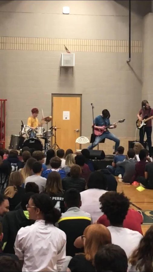 Limited Time Rock Group “Rainbow Prism Complex” plays at the Junior High School Talent Show in Spring 2019. (members from the left are Ben Drinkwater, William Polk, and Avery Steadham) 