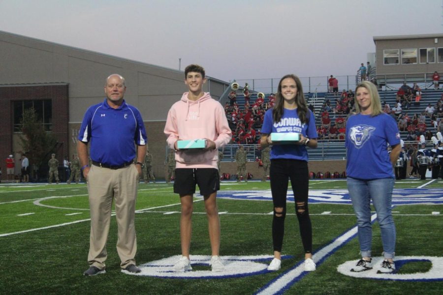 Coach Kennedy, Charlie Meek, Meg Swindle, and Coach Worlow