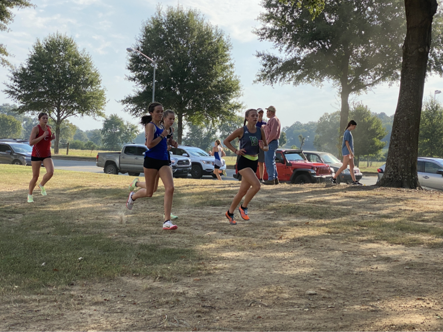 Junior Meg Swindle runs the Cyclone Invitational September 24.  She finished first, and the girls team won overall. 