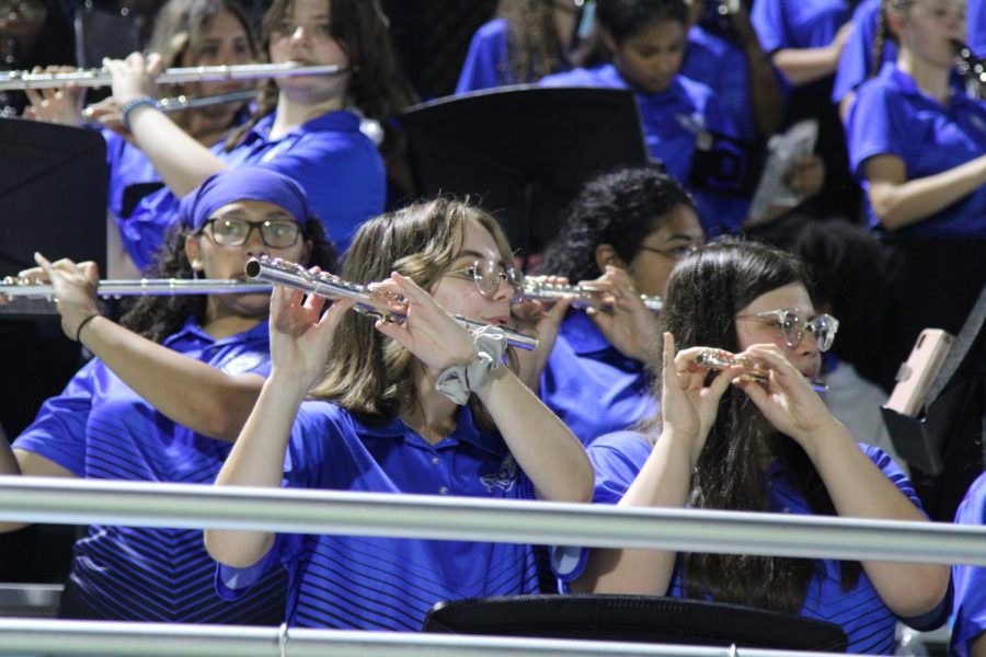 Junior Clara Spivey shown here playing her flute in Friday's game against Southwest.  