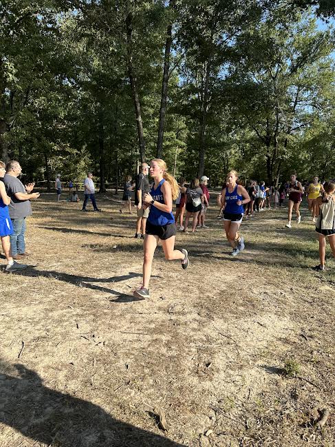 Annelise Benton, sophomore, runs the Falcon Run Invitational August 29. 