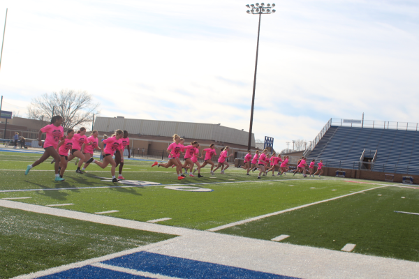 Conway Varsity Lady Cat’s Soccer run sprints so they will be in shape for the upcoming season. 
