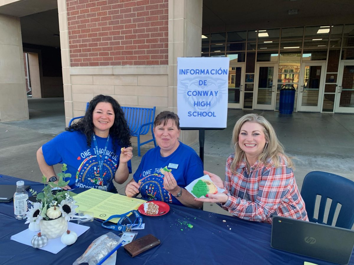 Senoras Tedford, Carson and Jernigan all help with last year's Hispanic Heritage Celebration in the courtyard. This year's is scheduled for October 6. 