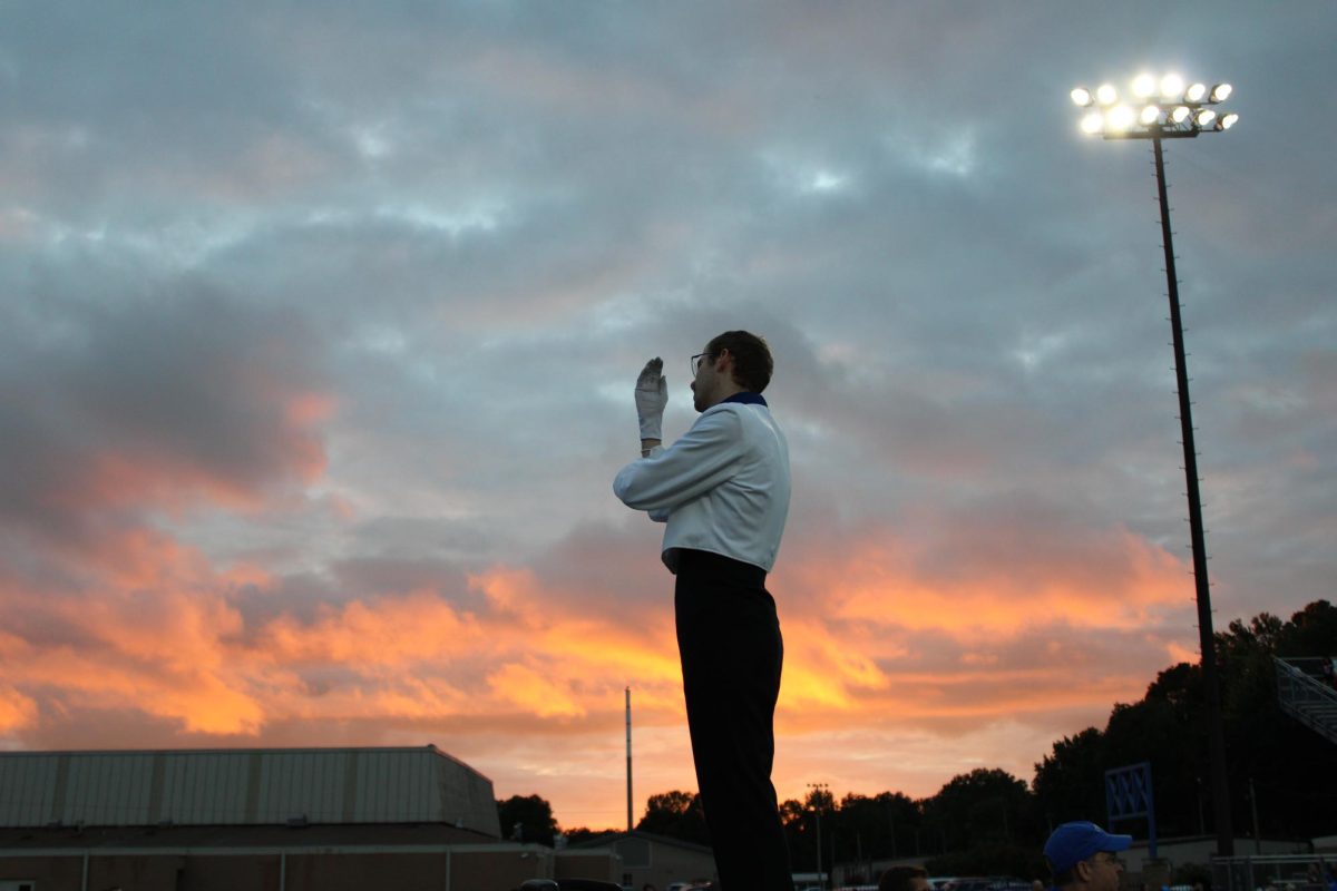 Starnes directing the band during a football game. 