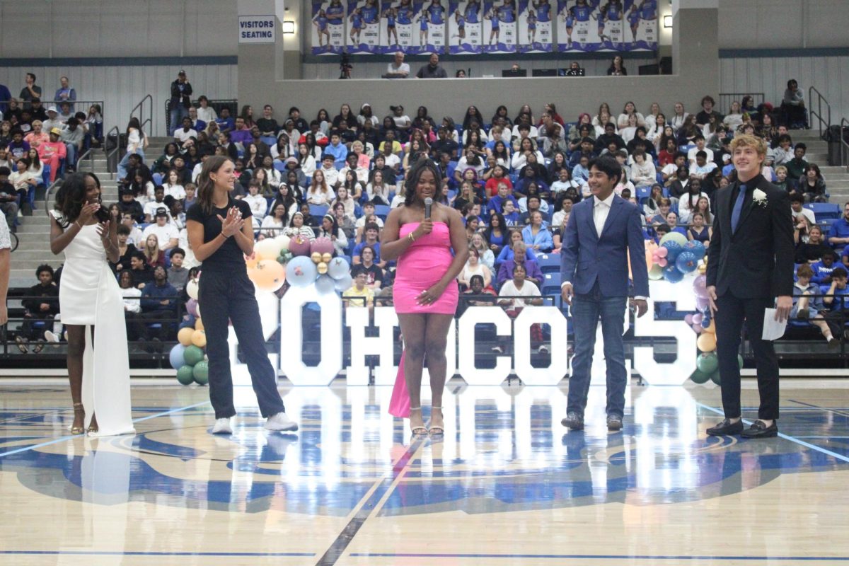 Marco Rivera-Suarez and other council members narrate the homecoming pep assembly. 