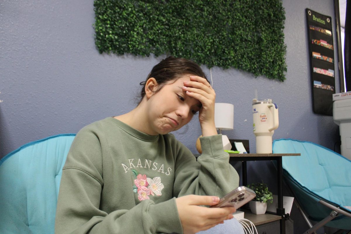 Senior Anna Liles is sad after seeing a negative comment on her latest Instagram post. 